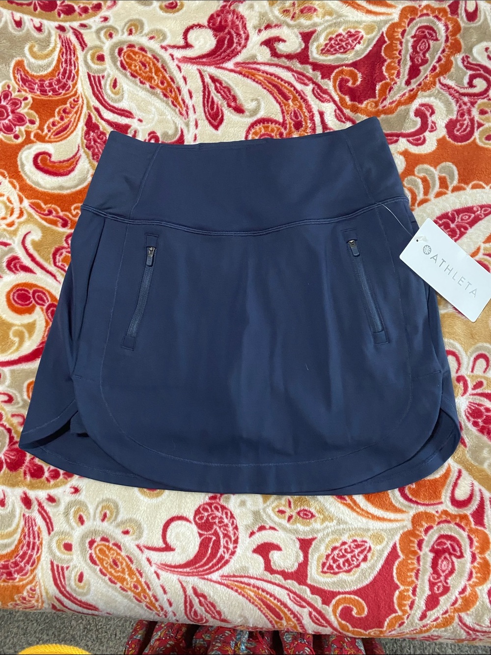 Athleta Navy Performance Skort with Zippered Pockets